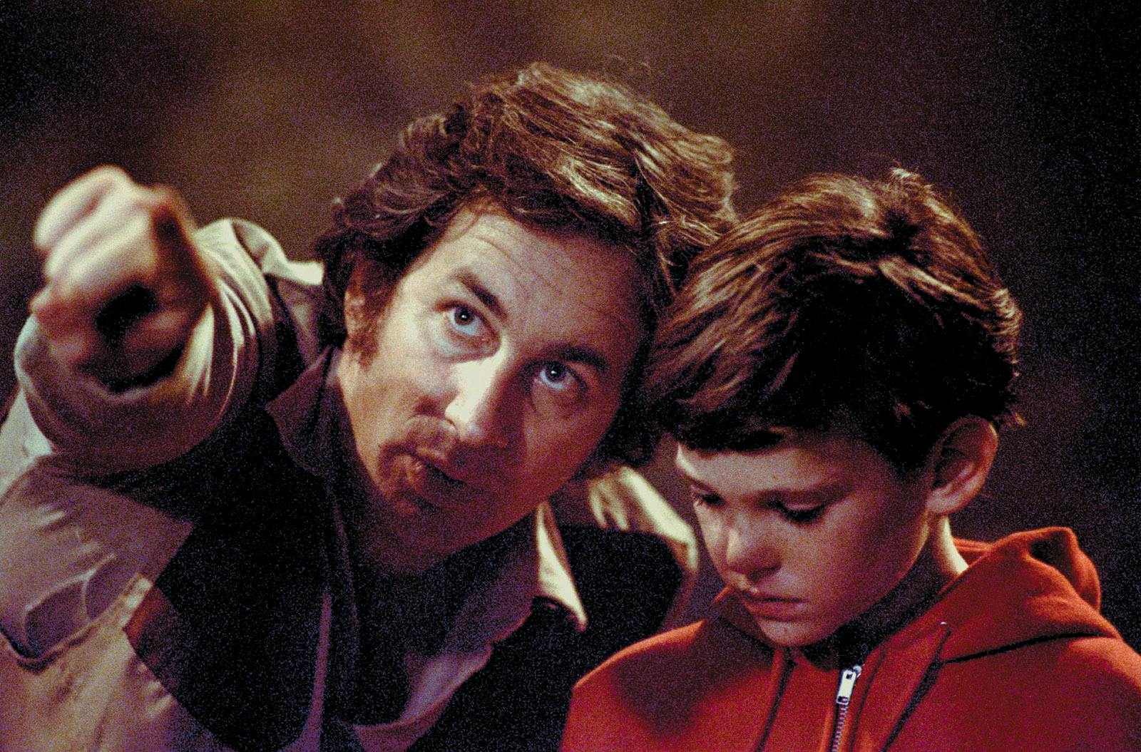 Steven Spielberg and Henry Thomas on the set of <i>E.T.</i>, 1982