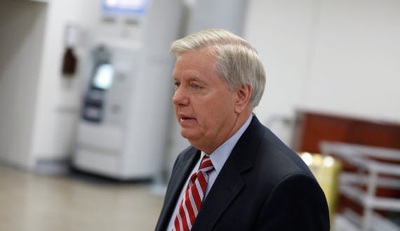 Senator Lindsey Graham (R-SC) arrives for a classified briefing on the airstrikes launched against the Syrian military, at the U.S. Capitol in Washington