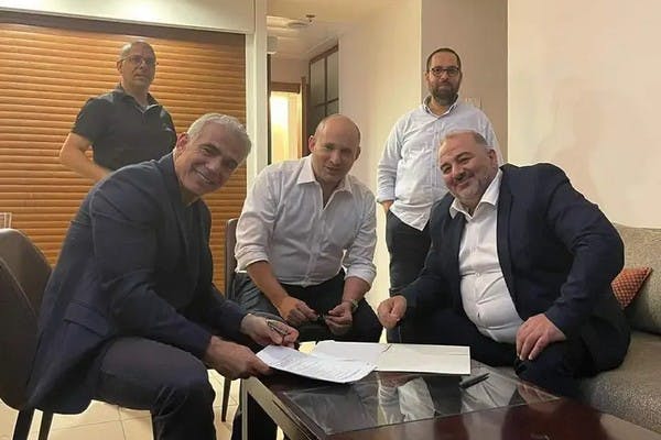 Yair Lapid, Naftali Bennett and Mansour Abbas in June 2021