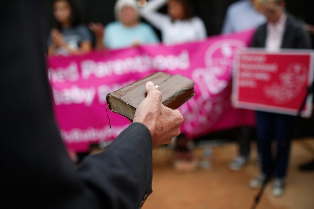 Right to Life advocates pray during a sit-in in front of a Planned Parenthood in Washington, D.C. (Win McNamee/Getty Images)