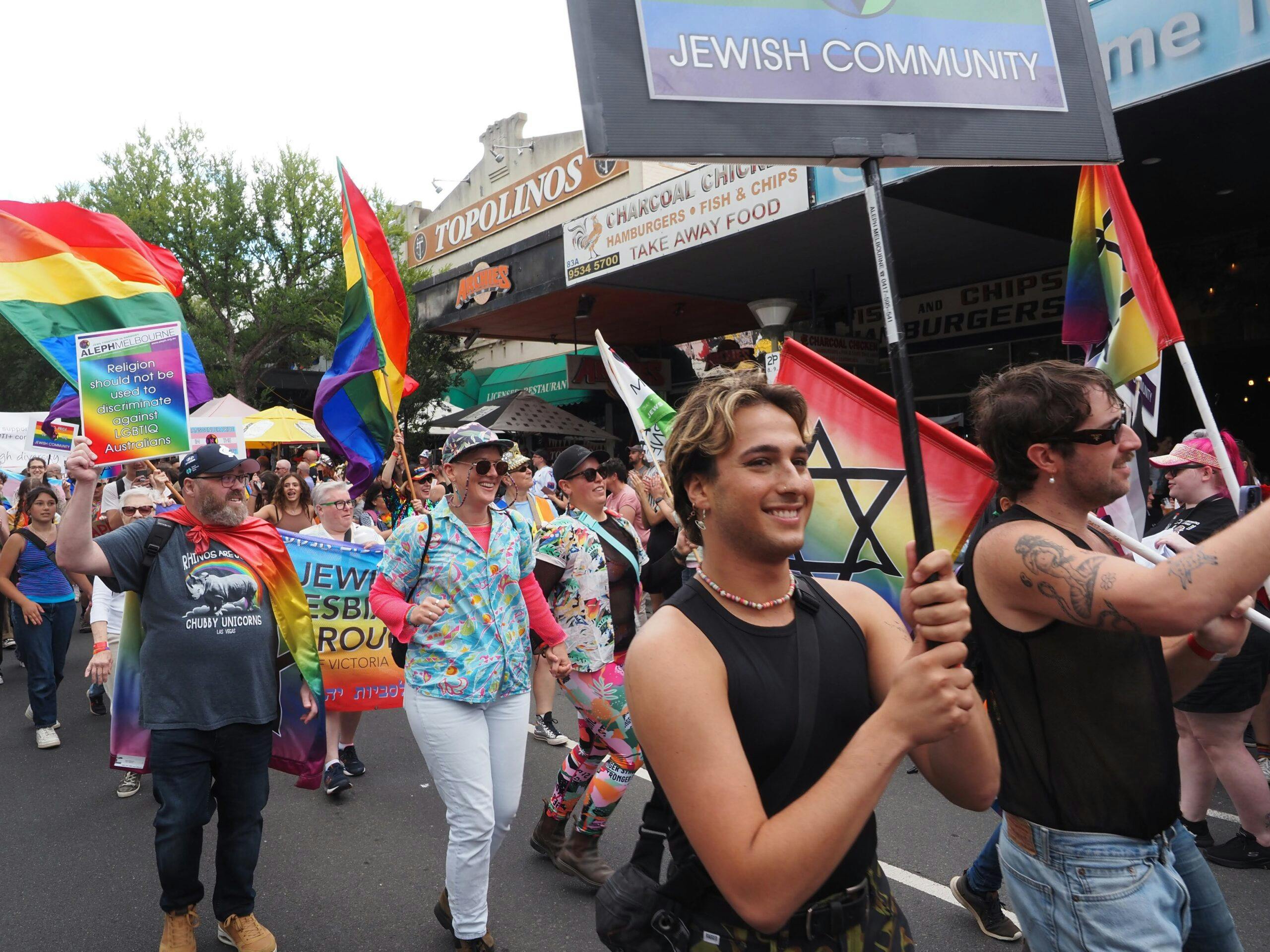 Happy faces marching in the Melbourne Midsumma pride march in 2023