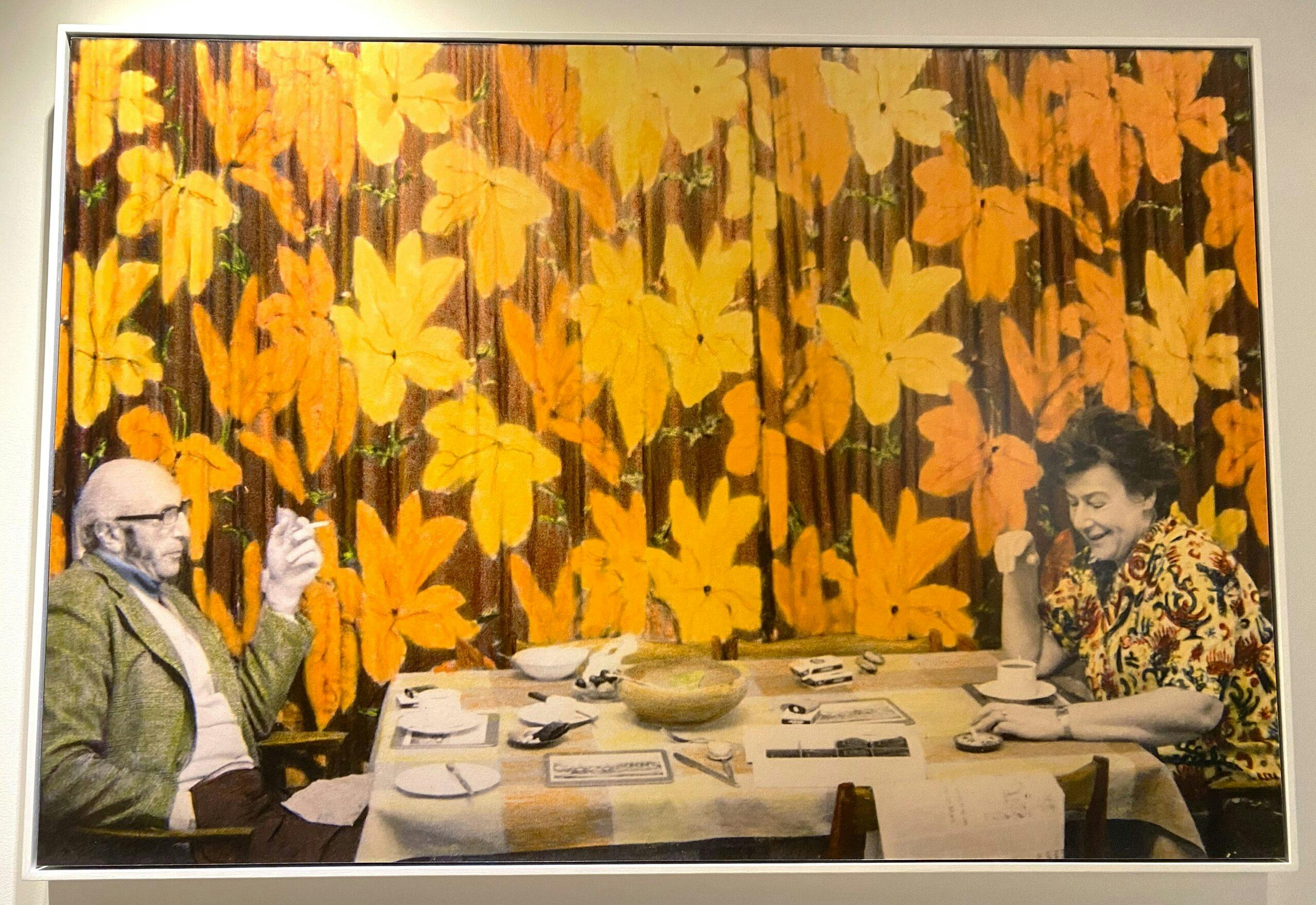 A painting showing an old married couple at a kitchen table with orange, yellow and brown flowers in the background