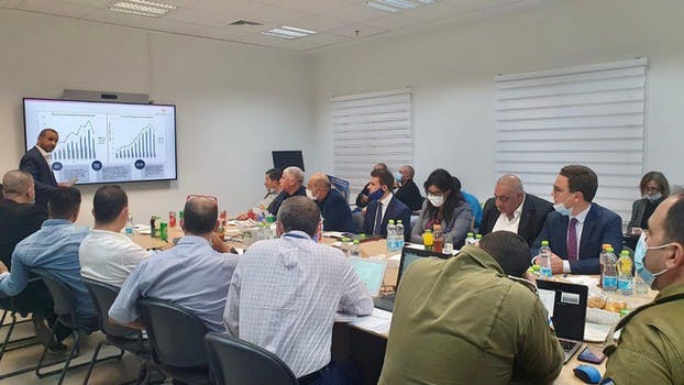 Palestinians and Israelis with the support of the EU agree to start a new initiative to introduce container shipping at the border crossing with Jordan, December 16, 2021 (EU).