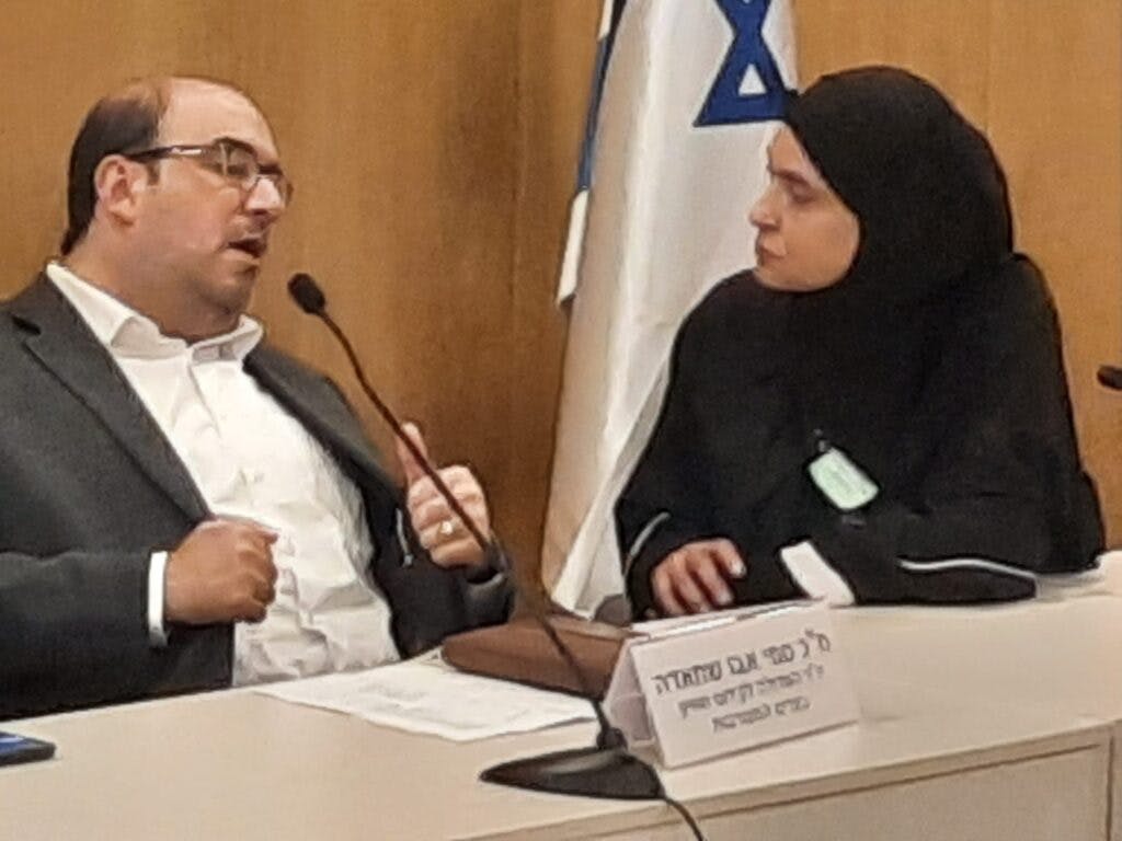 MK Sami Abu Shehadeh talks to Maha Ibrahim at the Knesset