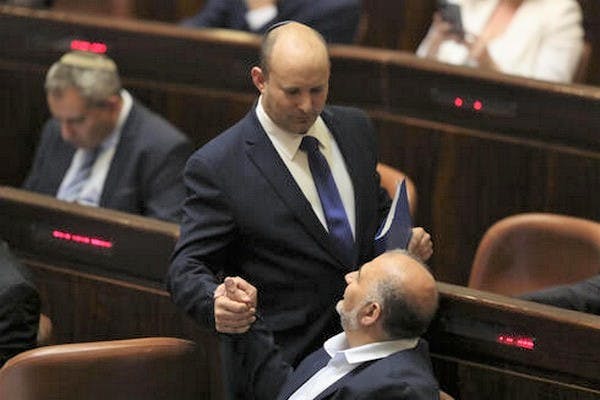 Bennett with Mansour Abbas, who heled formed a fragile coalition