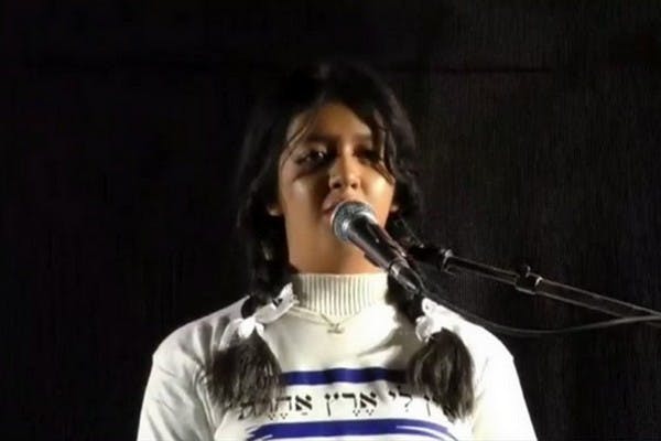 Eliyana Hayut, 13, singing Hatikvah at the Tel Aviv protest (Demokrat TV)