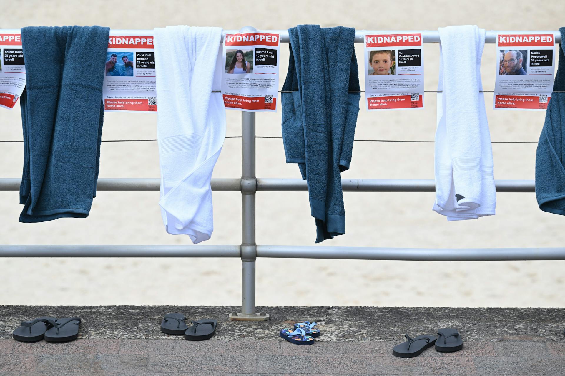 An installation of beach towels and thongs at Bondi Beach (AAP /Dean Lewins).