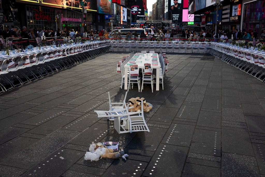 The empty Shabbat table installation in Times Square (Andrew Lichtenstein/Corbis via Getty Images).