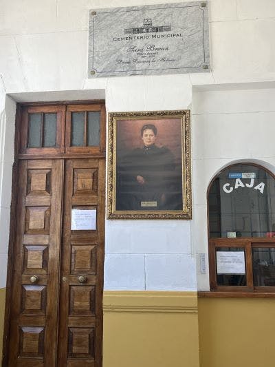 Sara Braun portrait at the entrance to the Punta Arenas cemetery (Sidra Kranz Moshinsky)