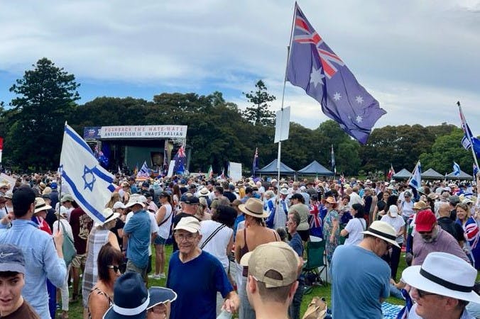 Crowd with Australian and Israeli flags